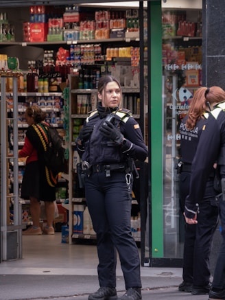 Police officers standing outside a store