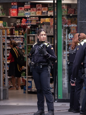 Police officers standing outside a store
