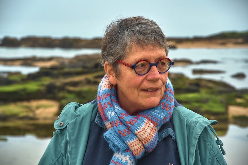 Elegant mature woman at coastal location