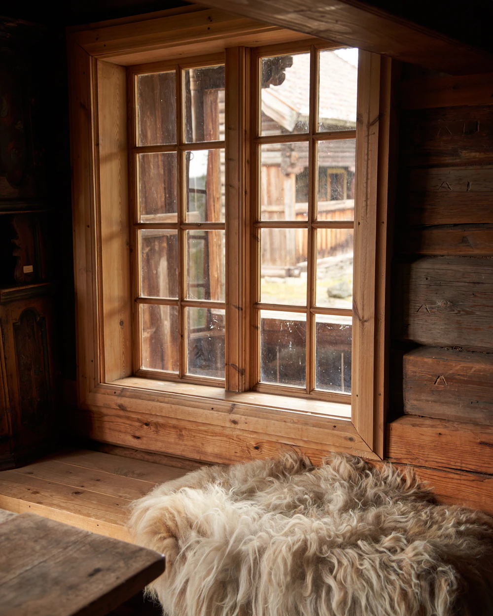 Sun-bleached wood window at Driftwood House.