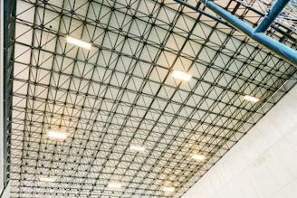 Geometric metal ceiling structure with lights