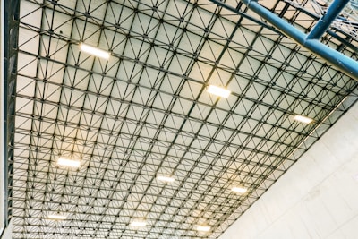 Geometric metal ceiling structure with lights