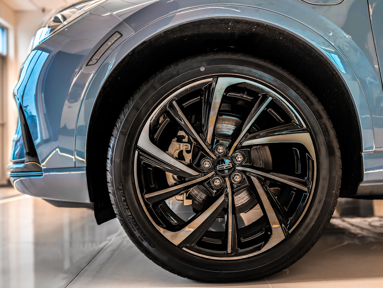 Glossy ceramic-coated wheel and tire close-up