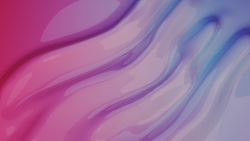 Abstract flowing waves of pink and blue colors.