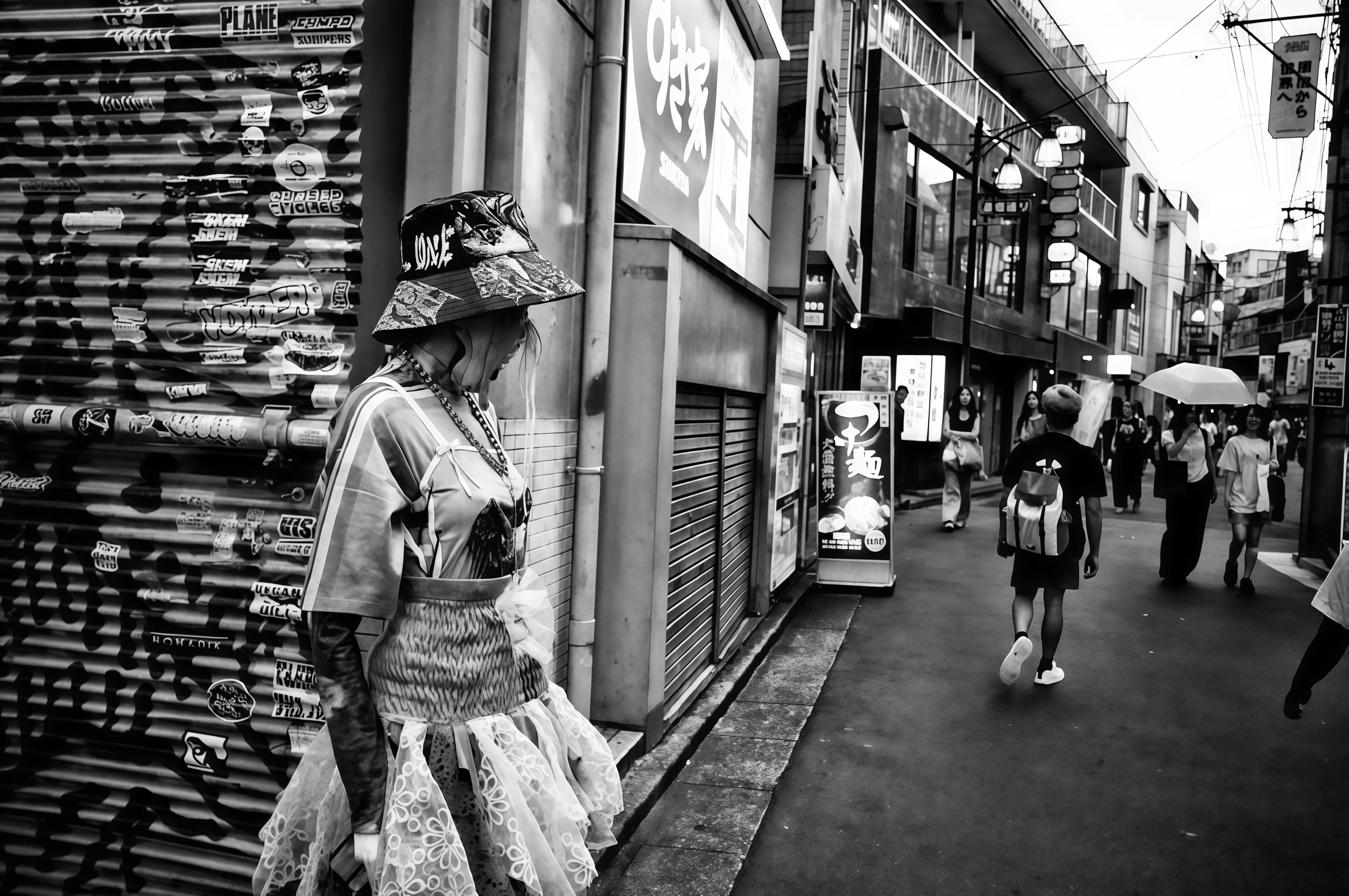 Woman in elaborate hat on a city street