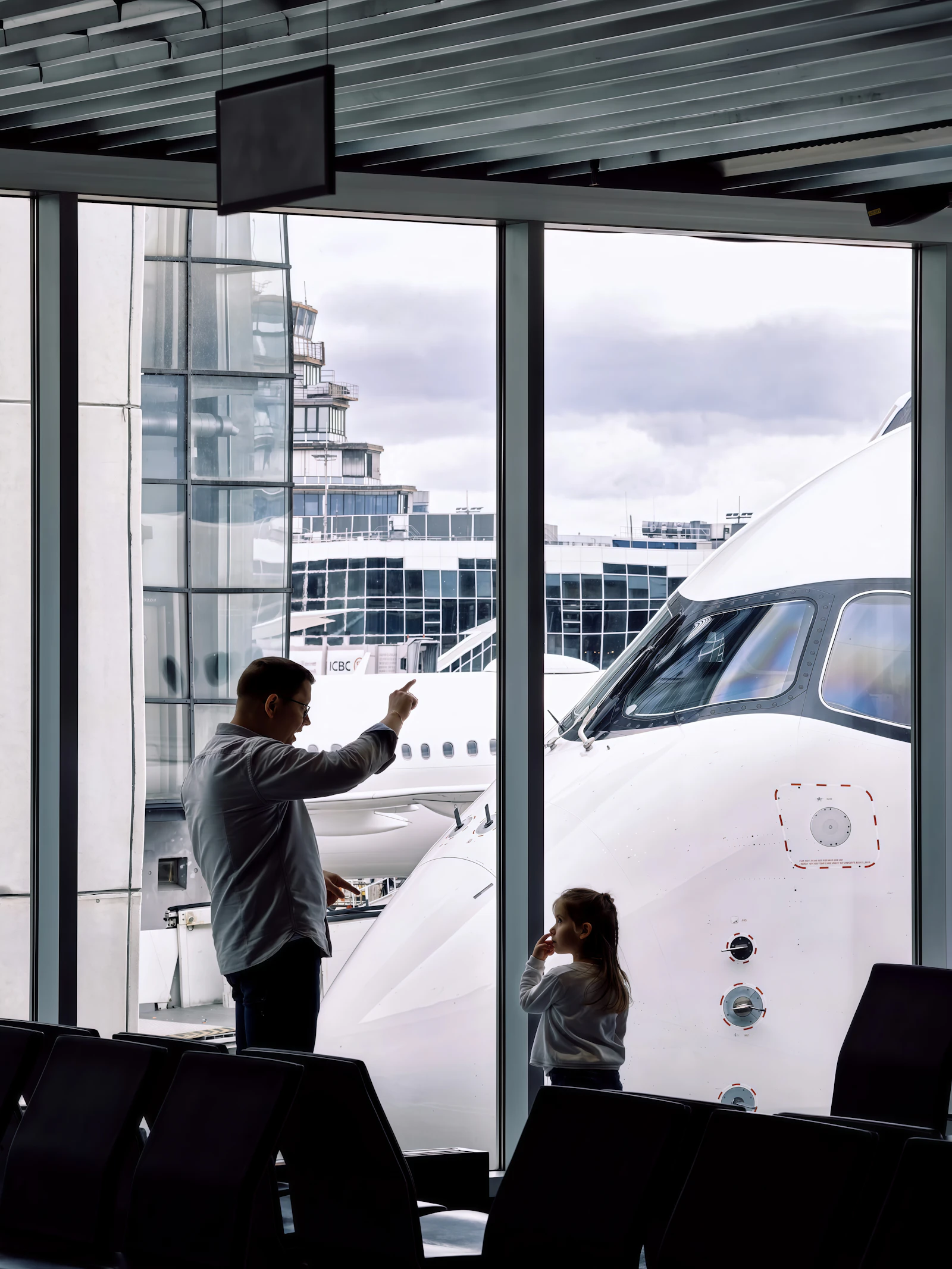 Happy family arrival travel scene with coordinated luggage