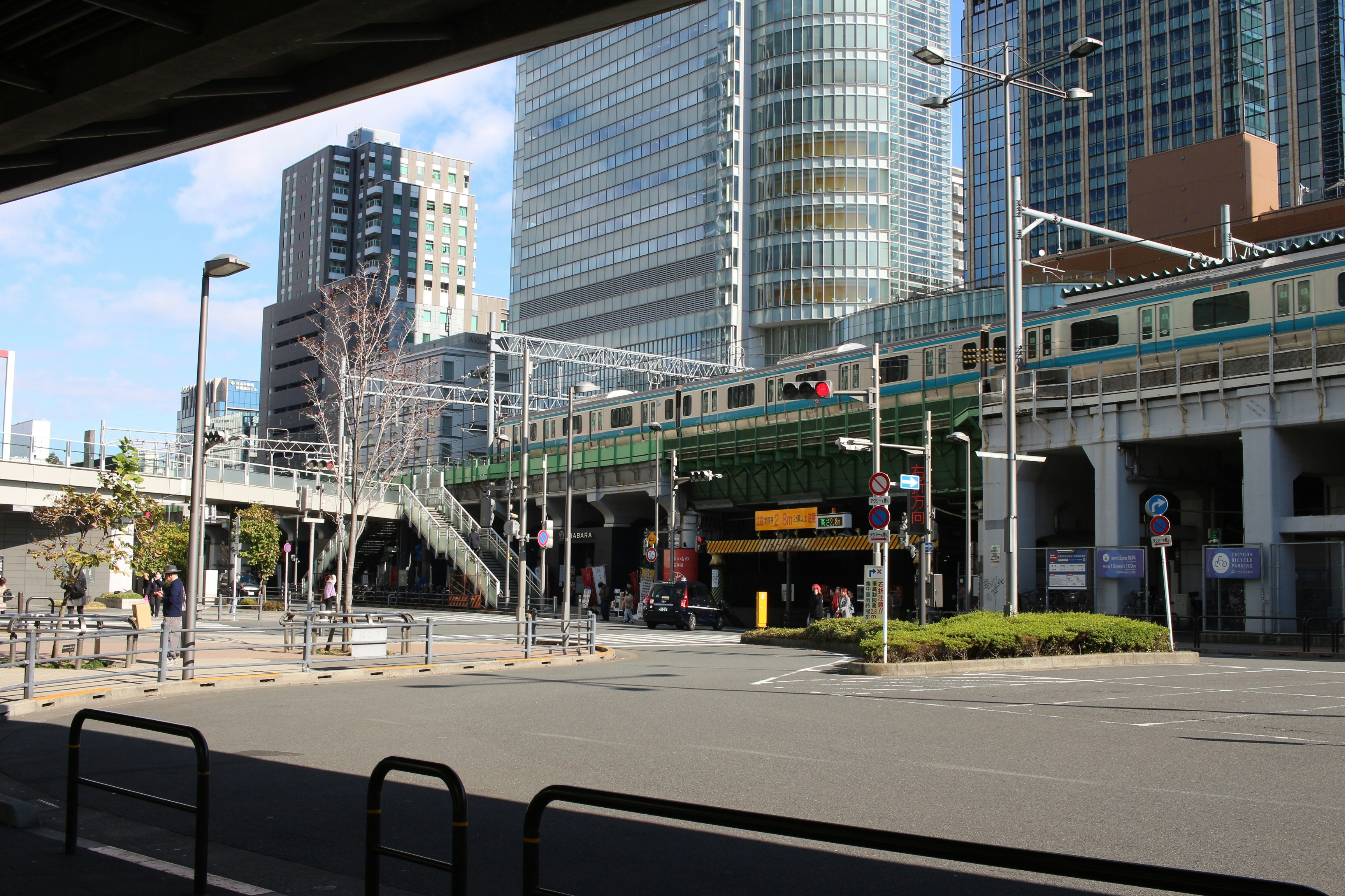 Train station with modern buildings in background