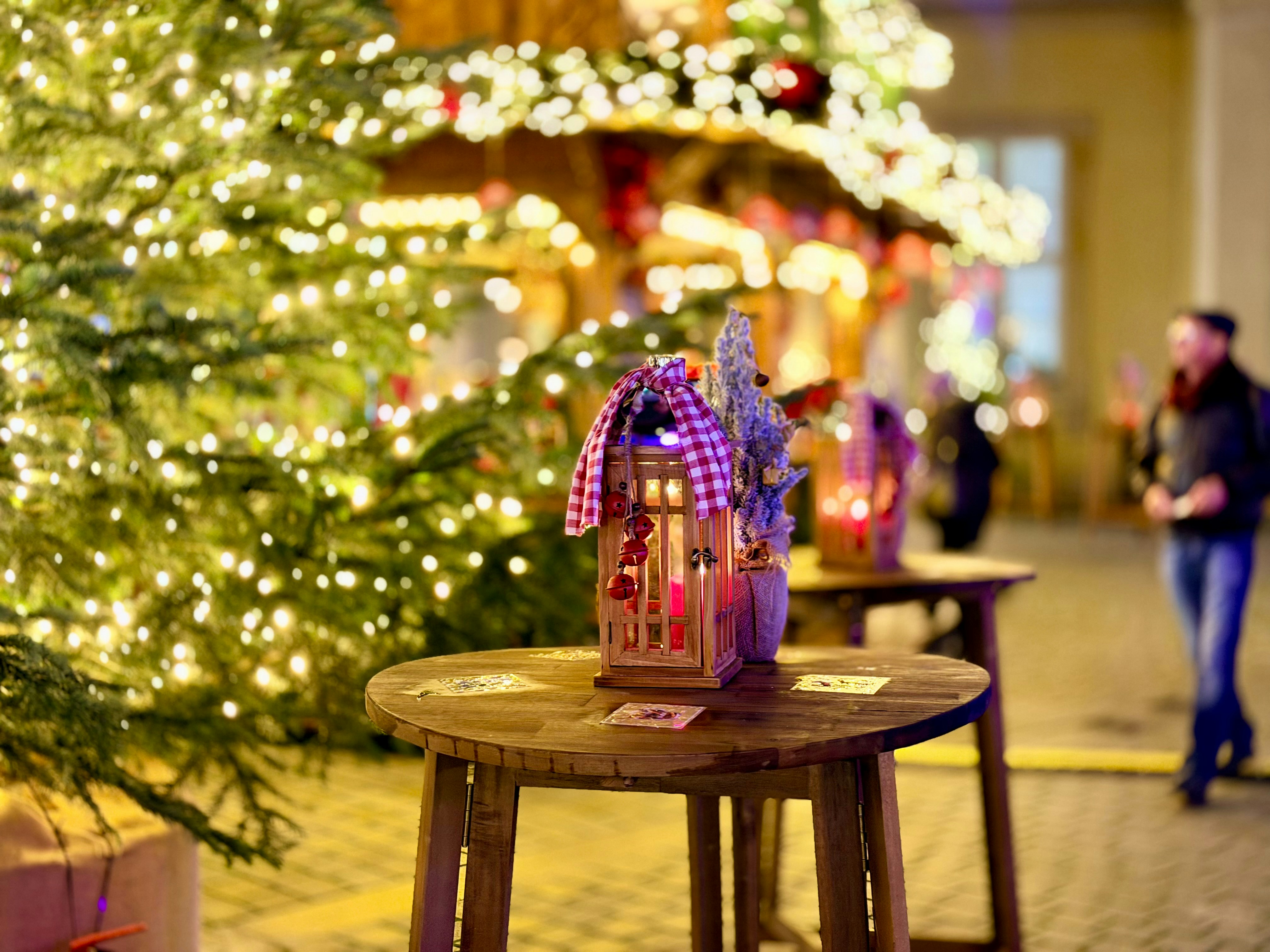 Christmas market with decorated lanterns and lights