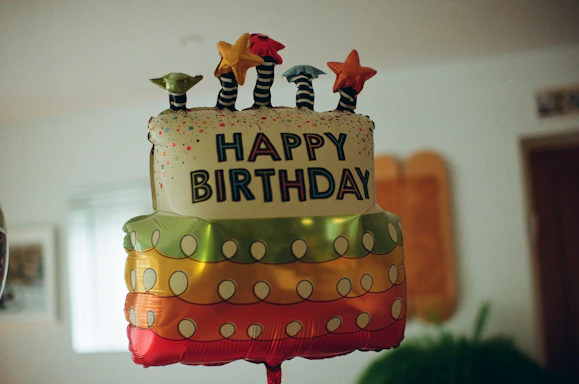 Happy birthday cake balloon with stars
