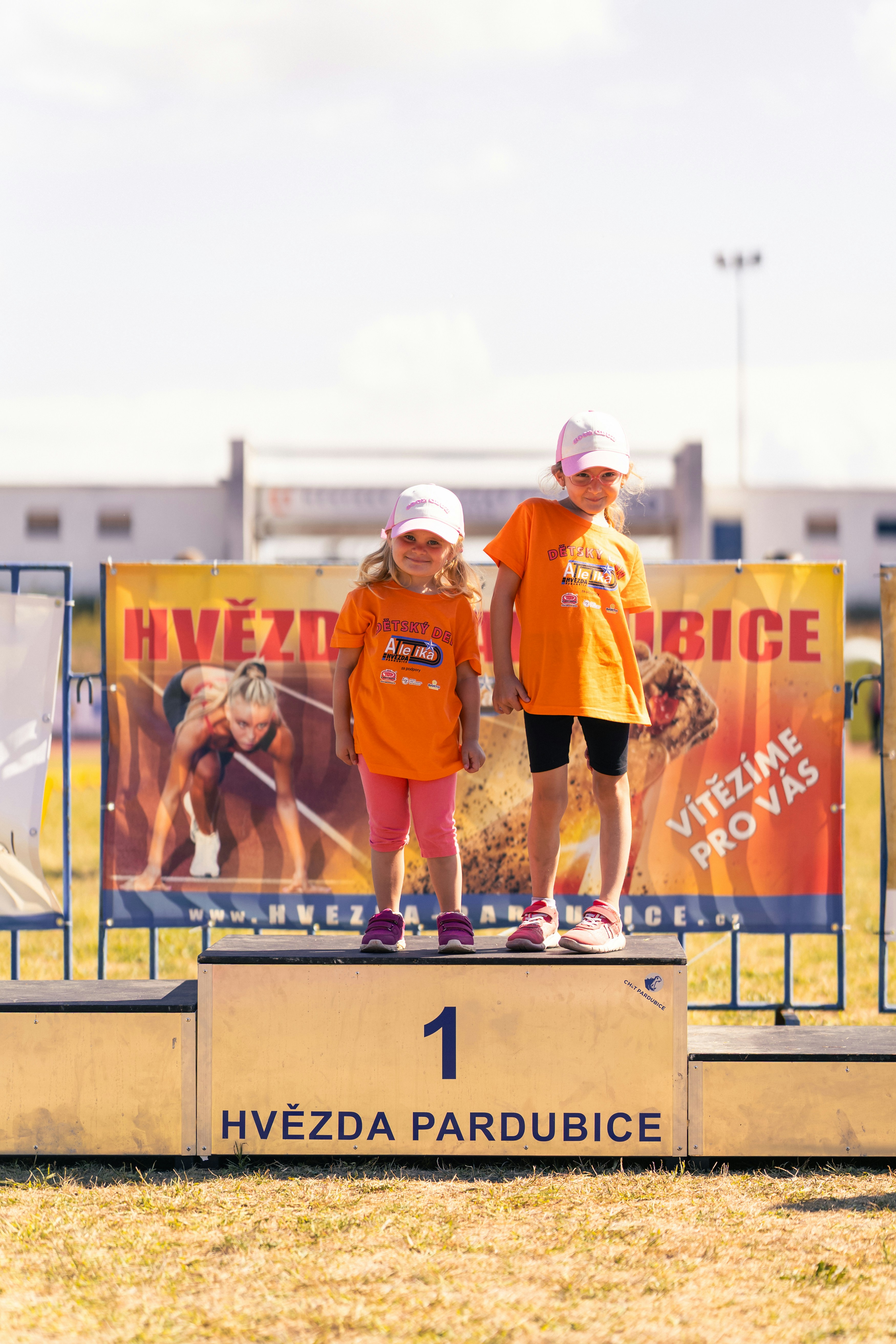 Two young girls on a winners podium