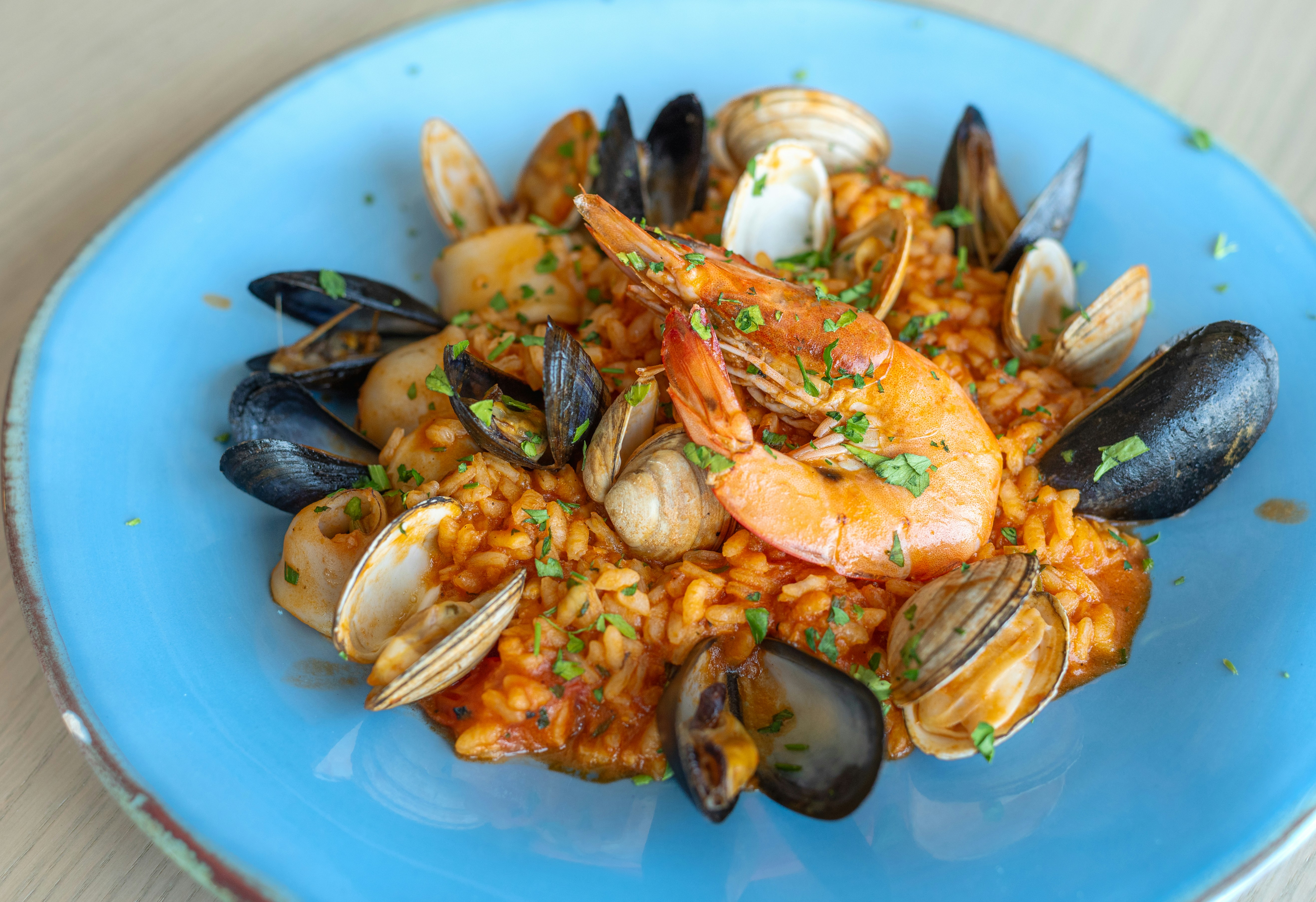Seafood paella with shrimp, mussels, and clams