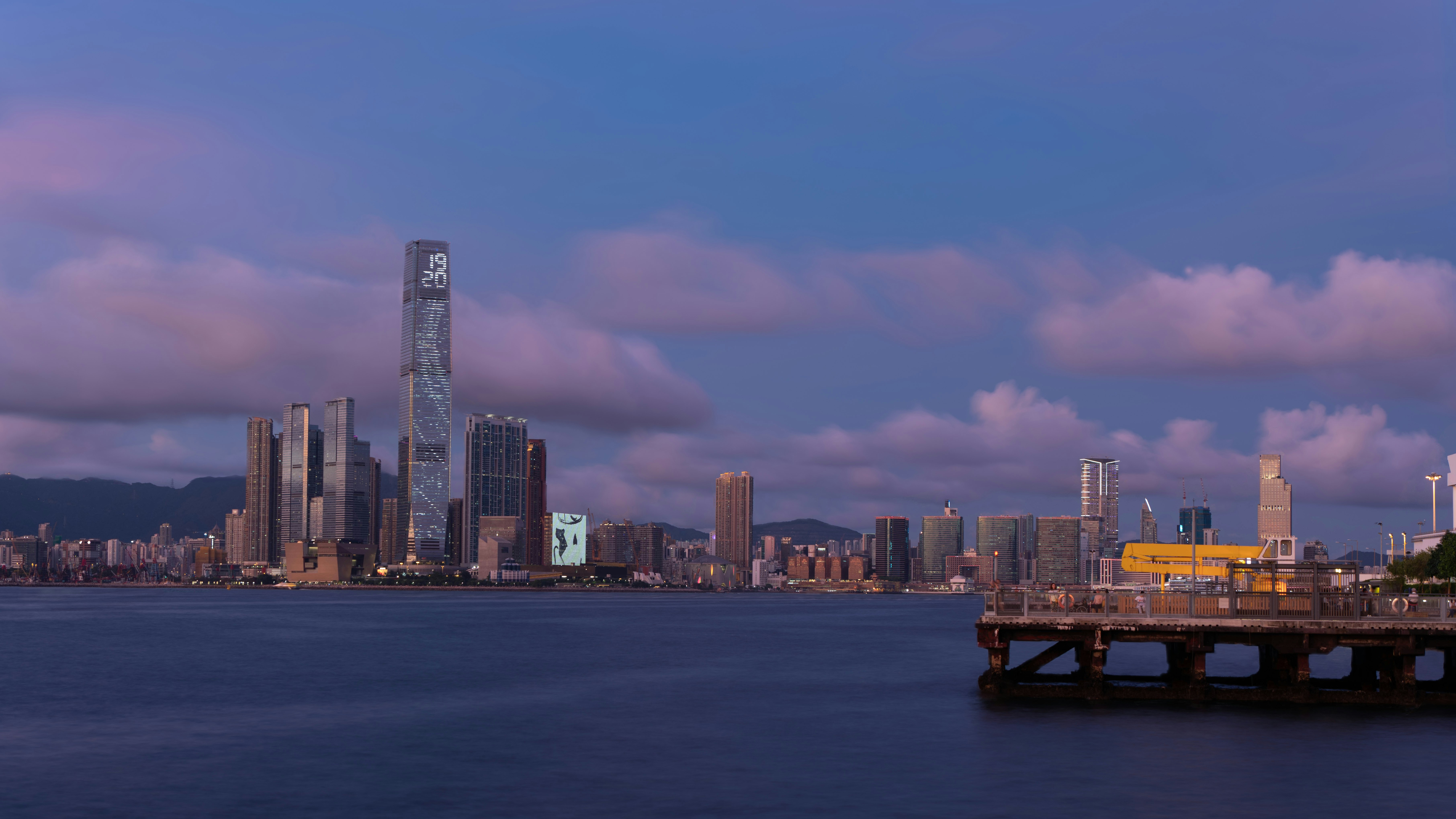 City skyline with modern skyscrapers at dusk