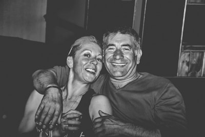 A happy couple embracing and smiling