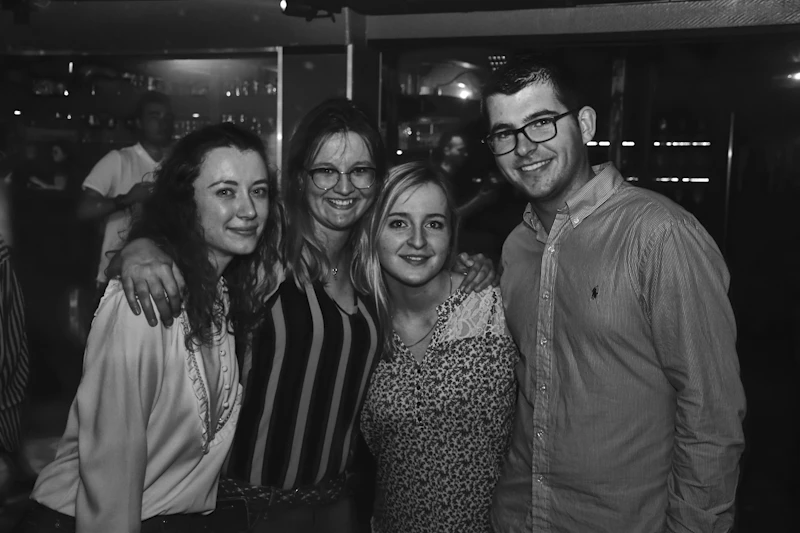 Friends smiling and celebrating together at a party