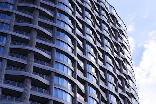Modern building with curved architectural details and blue windows