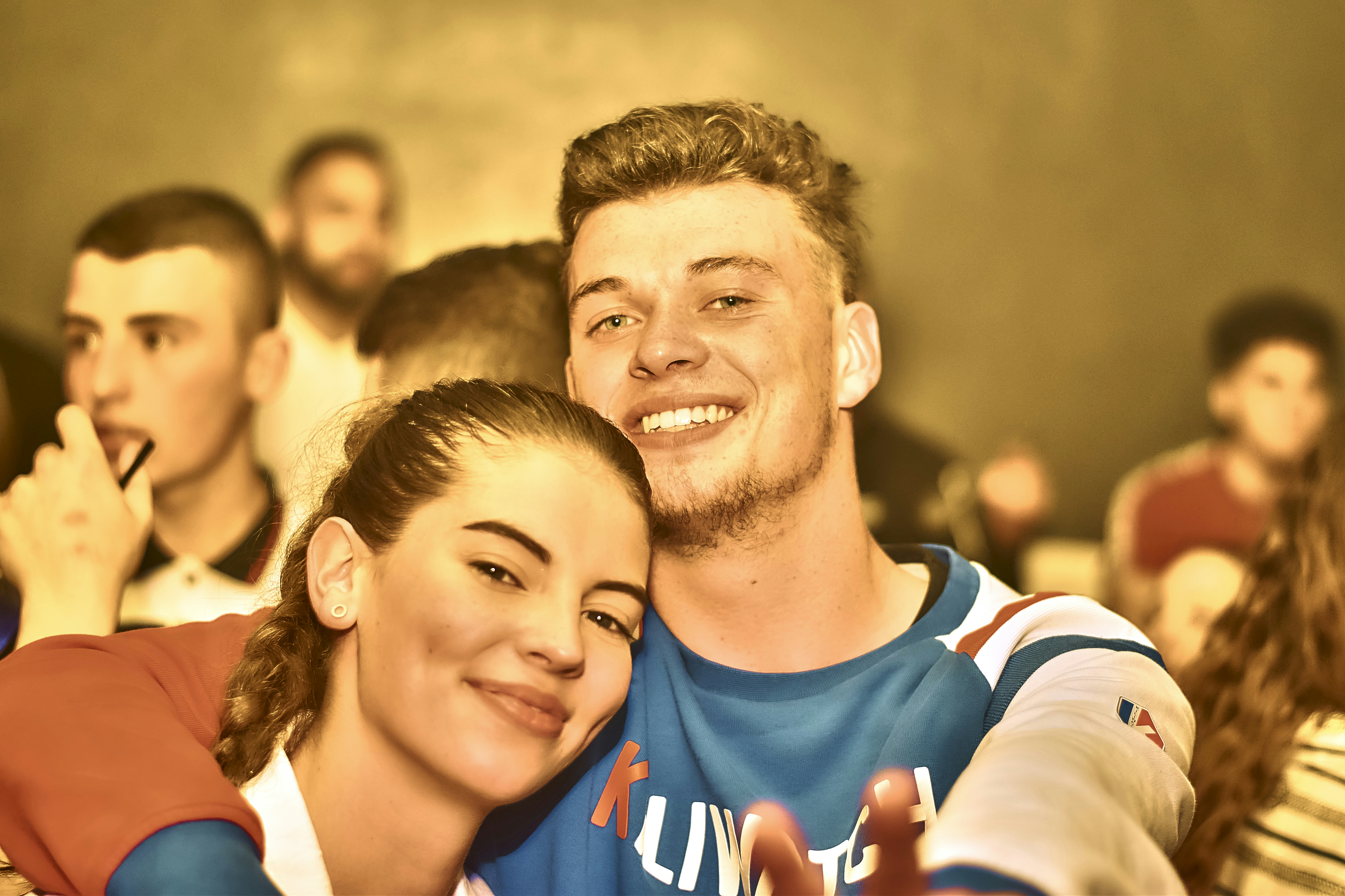 Young couple smiling at the camera