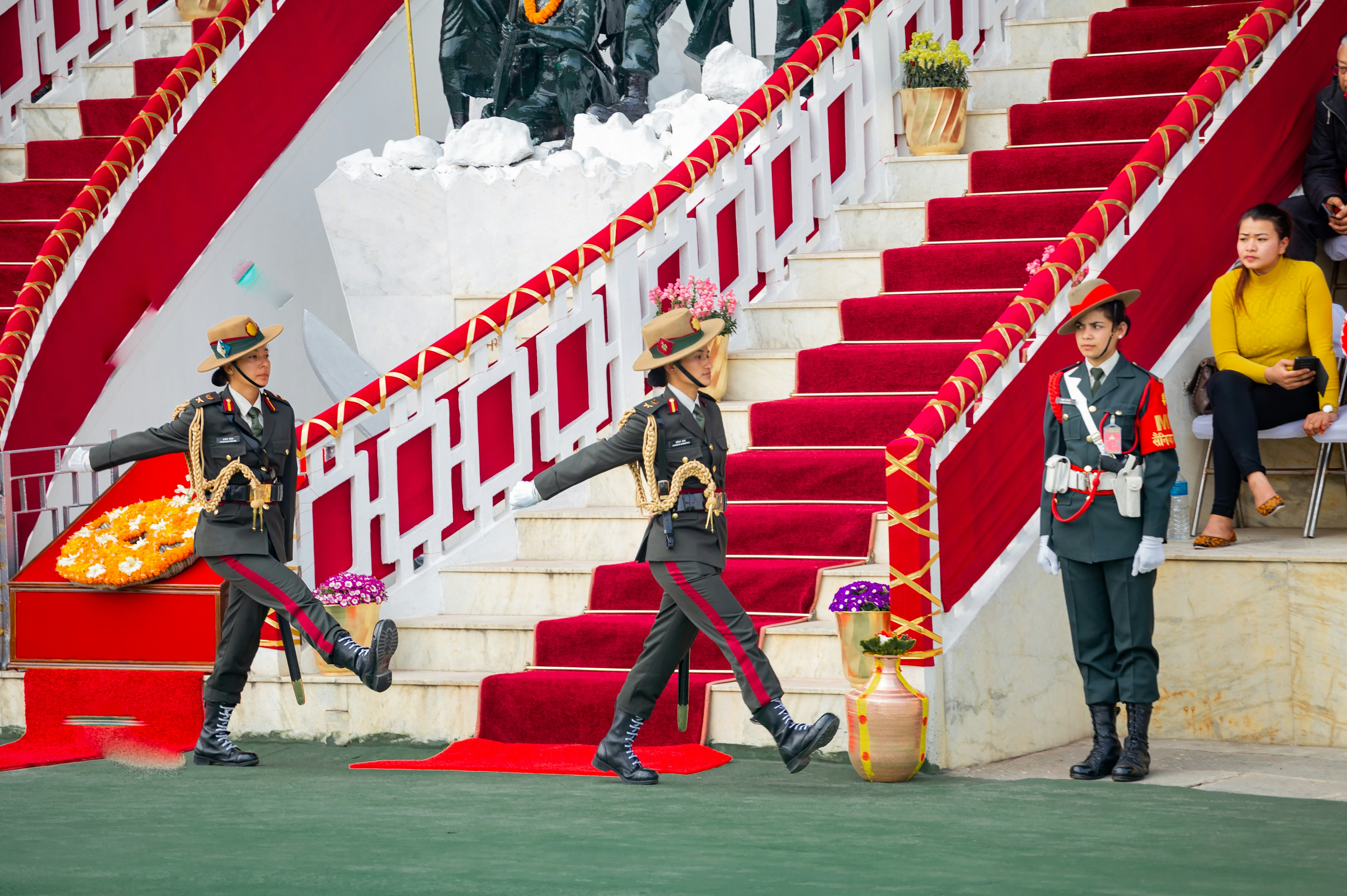 Soldiers in uniform marching on a decorated grandstand (Photo by Sushanta Rokka on Unsplash)