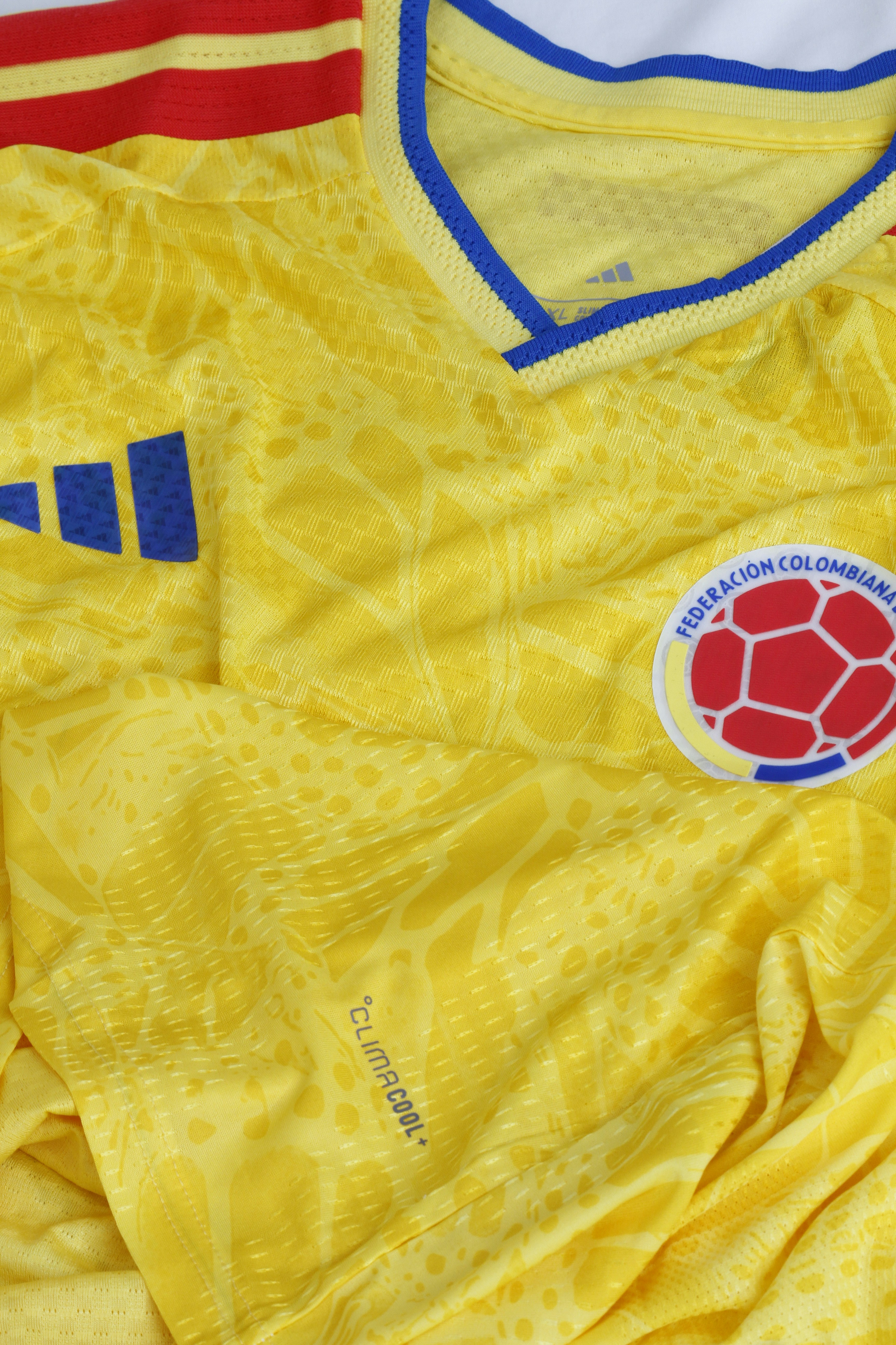 Yellow colombian soccer jersey with crest