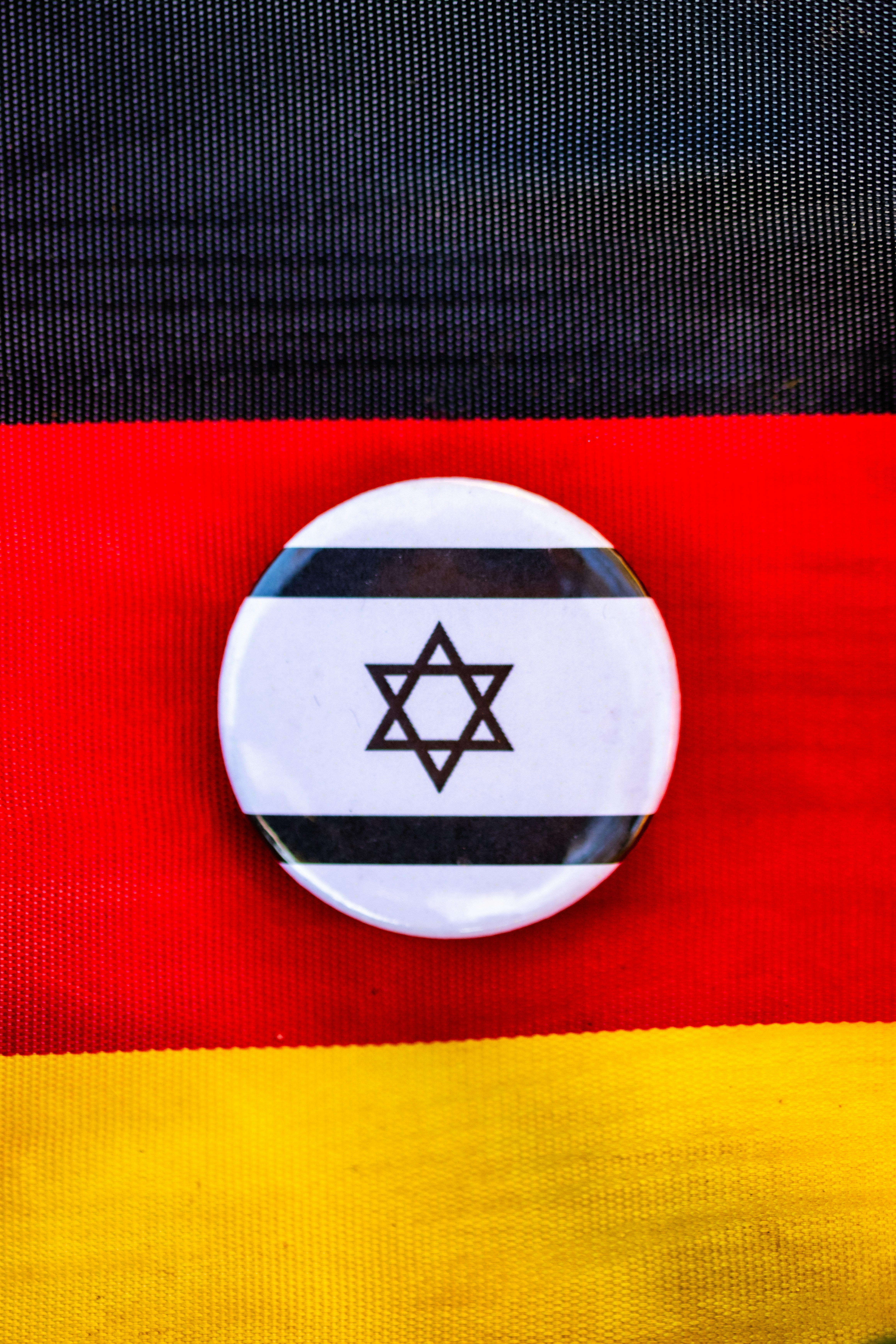 German flag with star of david badge