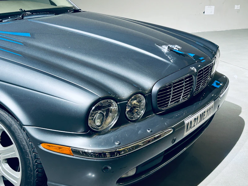 Close-up of a dark grey jaguar car front