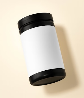 Black jar with a blank white label
