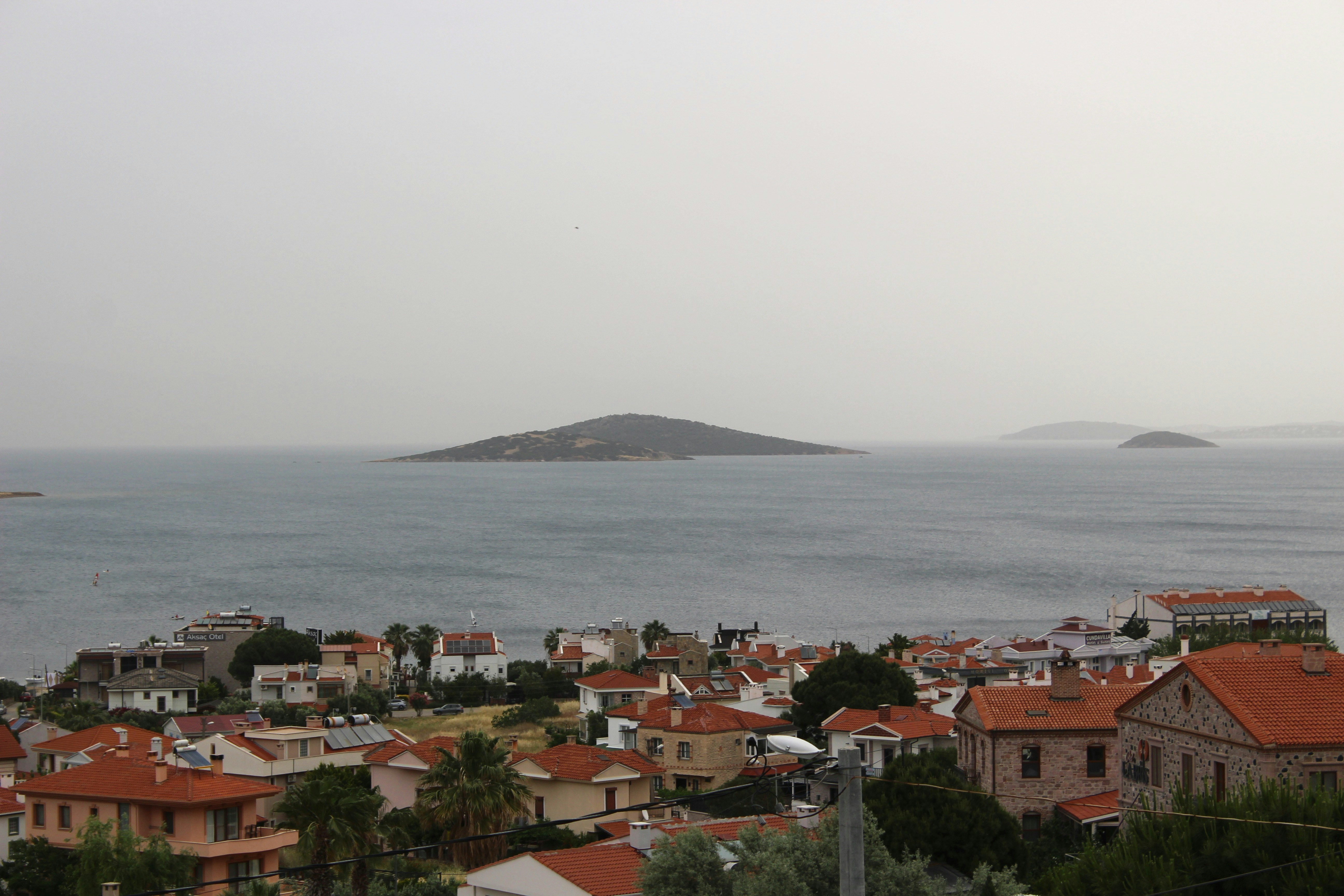 Coastal town with islands in the distance