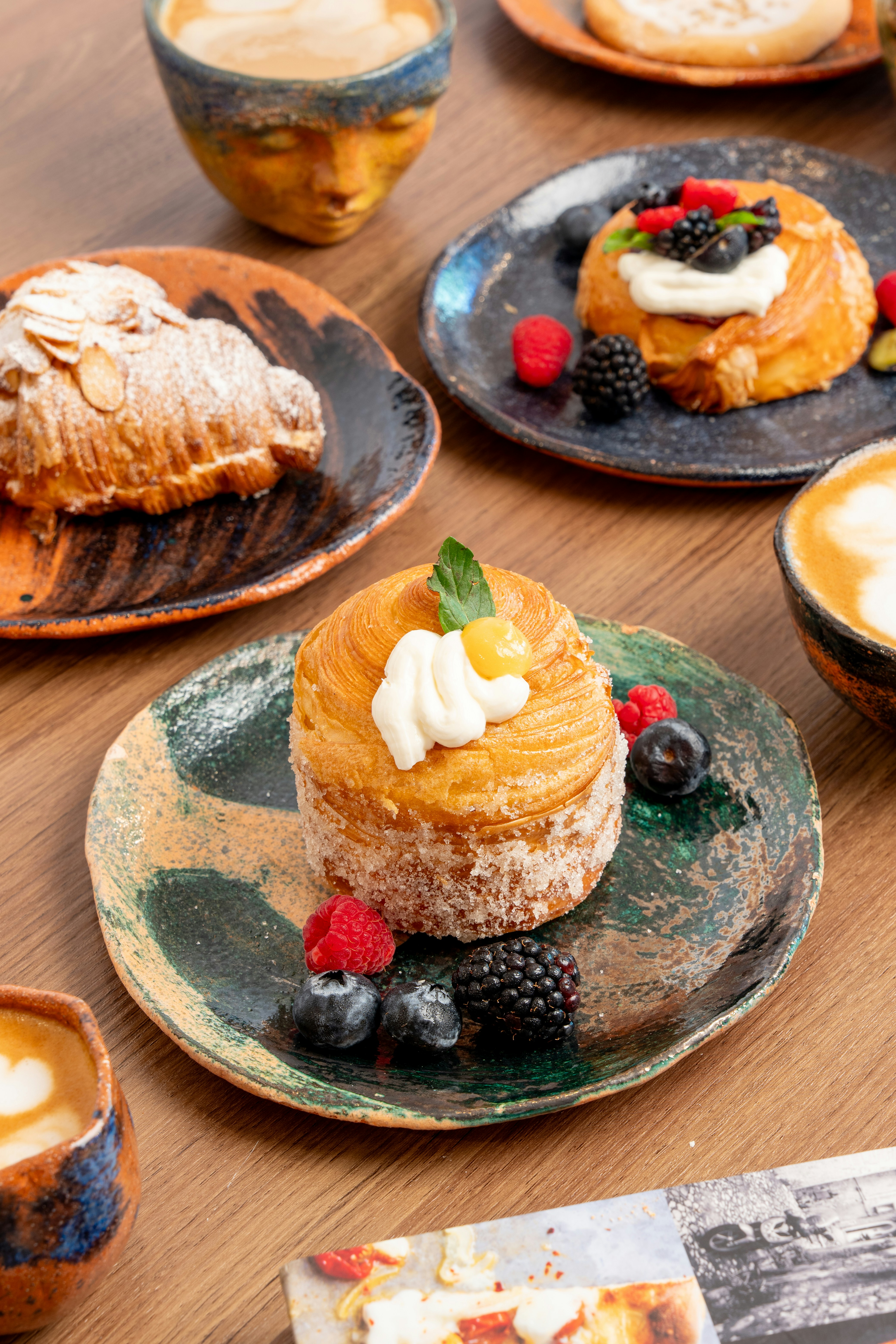 Pastries and coffee on a wooden table