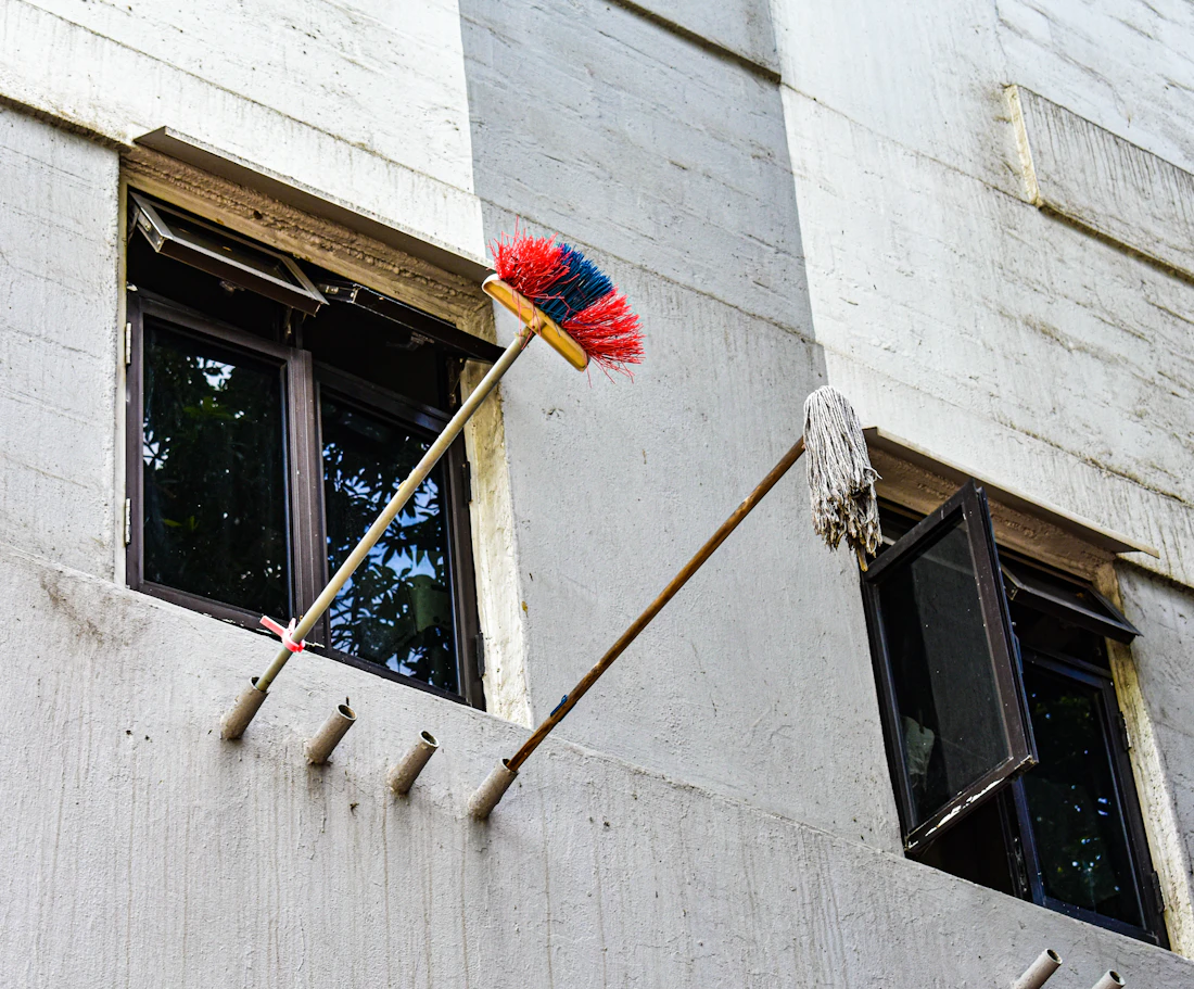Window cleaning tools on an exterior building window