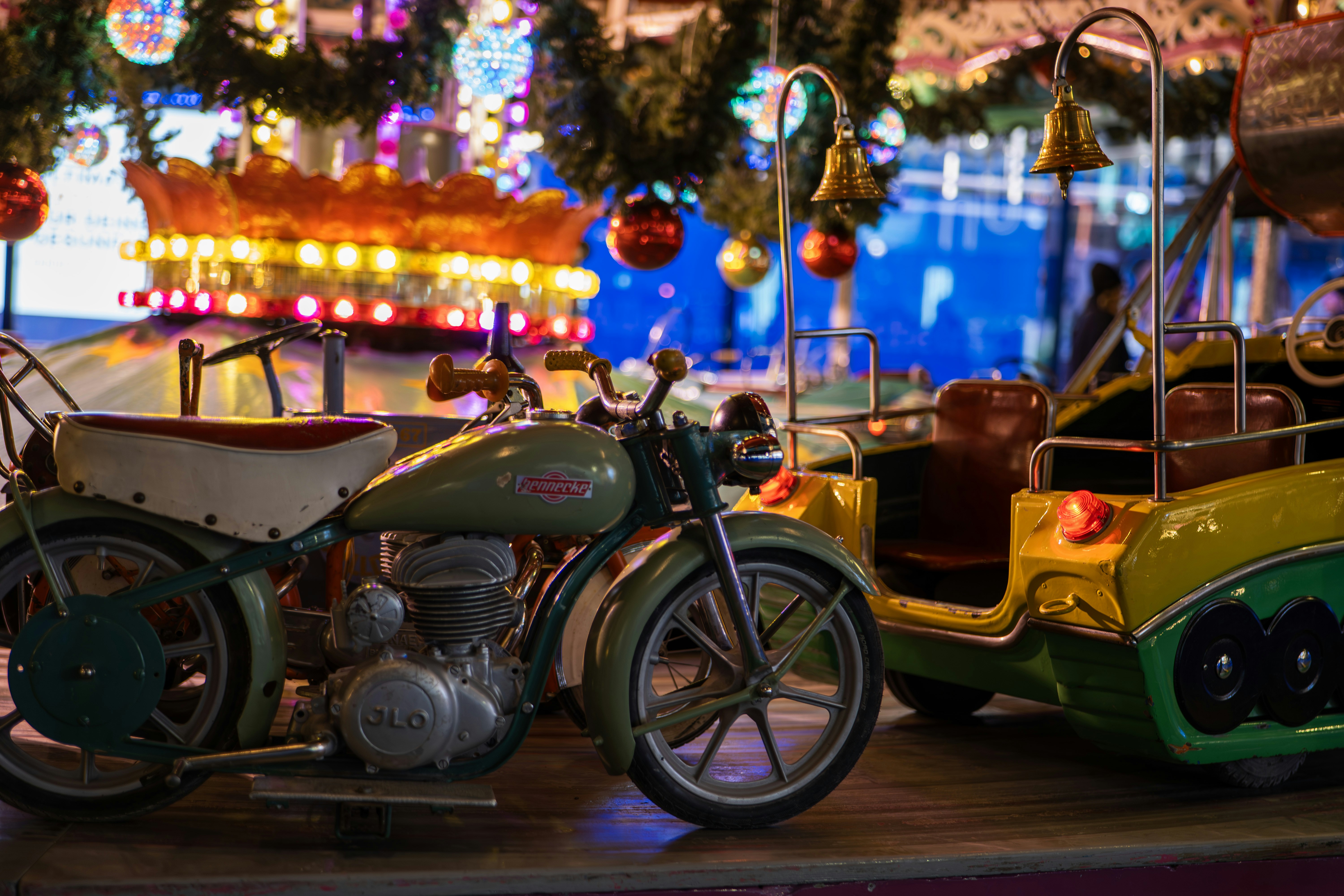 Motorcycle and carousel rides at amusement park