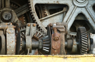 Close-up of rusty industrial gears and machinery