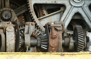 Close-up of rusty industrial gears and machinery