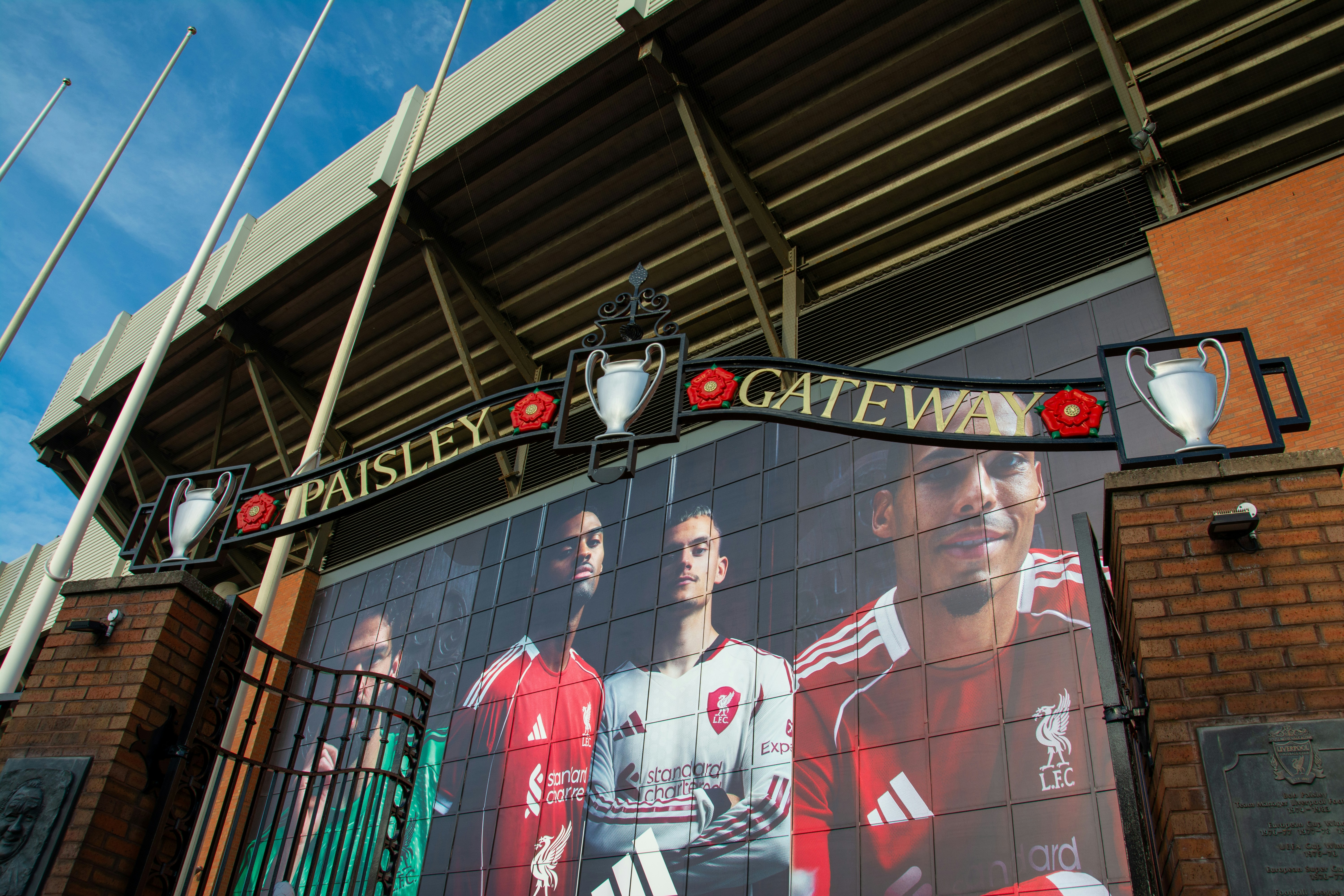 Paisley gateway entrance with football players mural