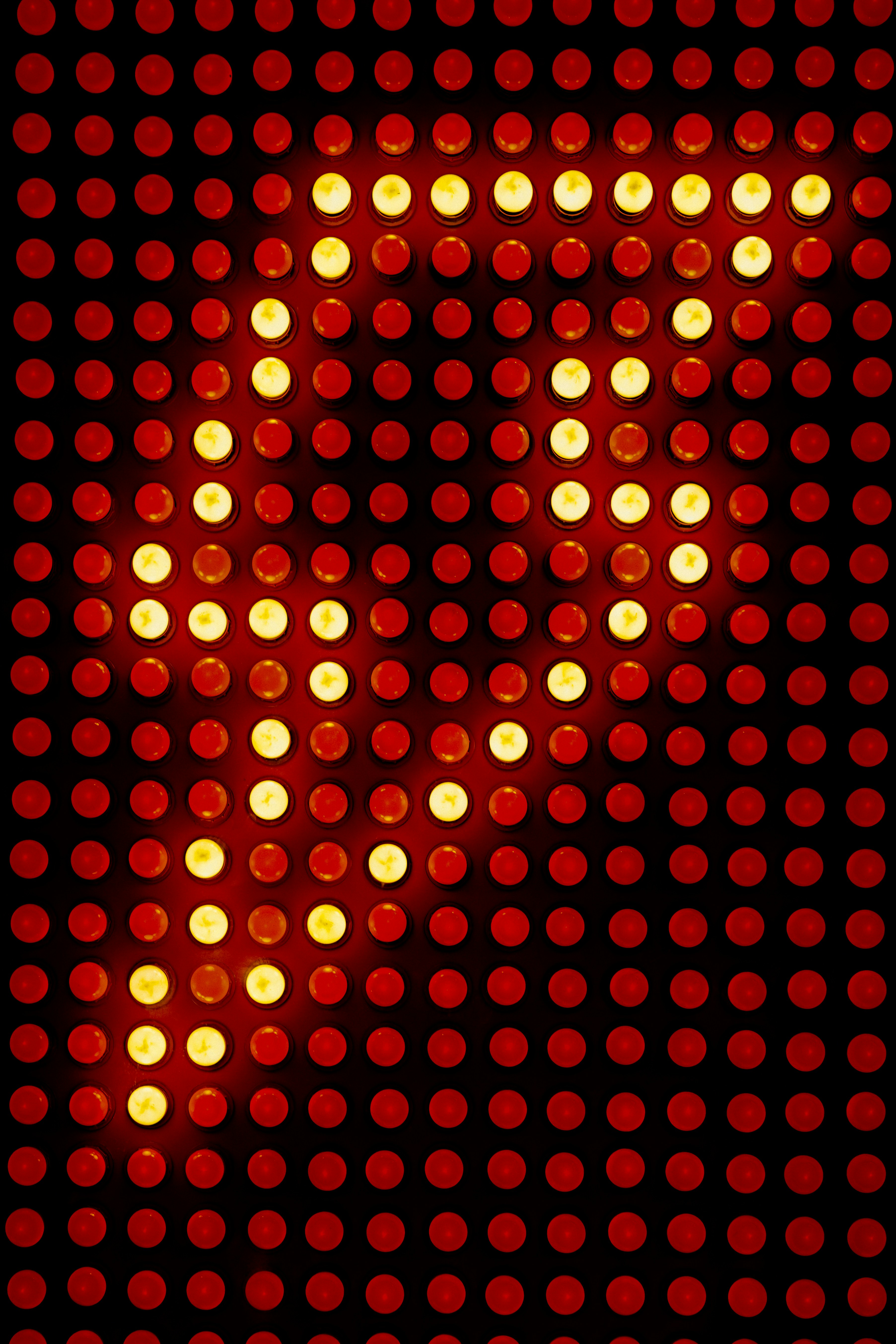 Red and yellow lights arranged in a grid pattern.