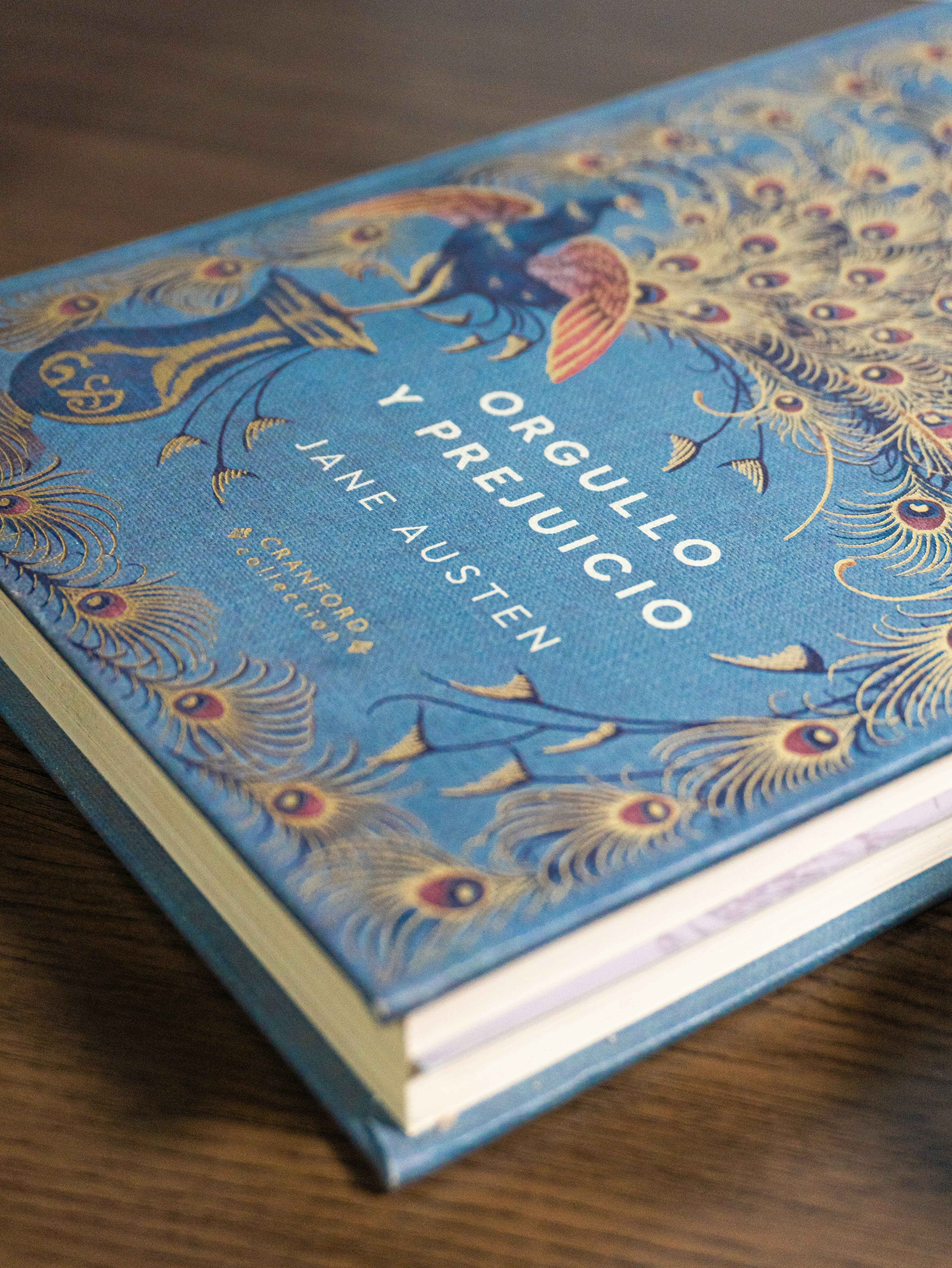 Pride and prejudice book cover with peacock design