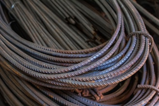 Bundles of rusty rebar steel rods