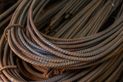 Coiled rusty rebar rods for construction material