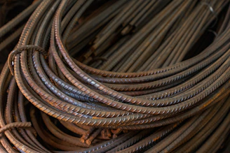 Coiled rusty rebar rods for construction material