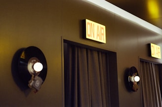 Two "on air" signs above studio doors
