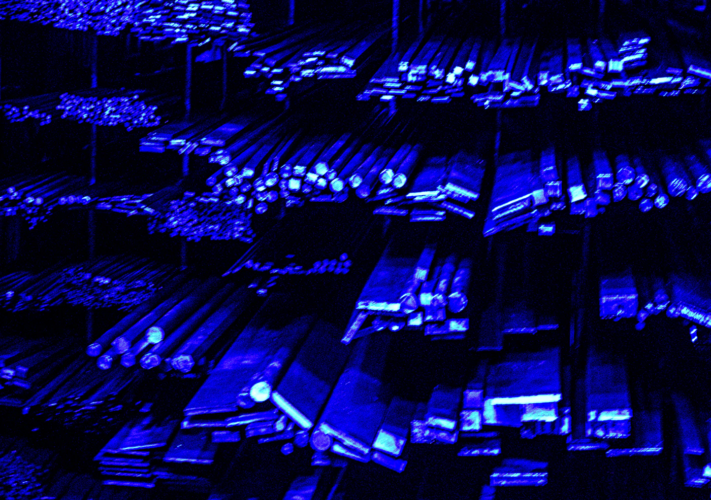 Server room lit in blue, the computing infrastructure behind AI models