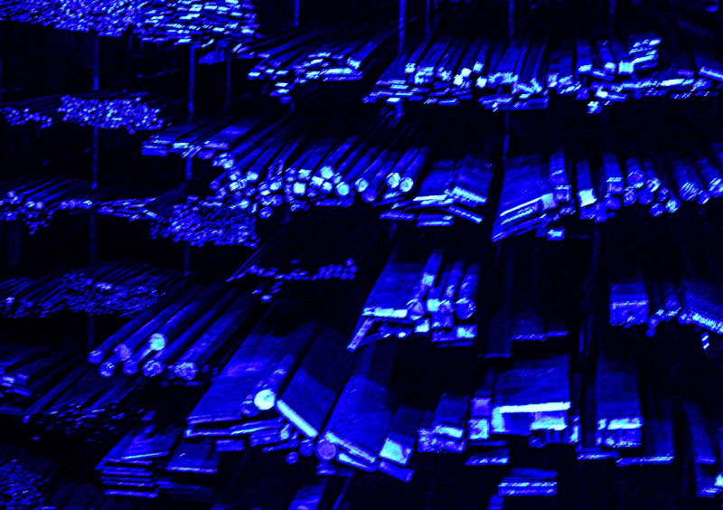 Rows of rack equipment glowing in blue light