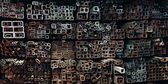 A wall of various metal pipes and tubes.