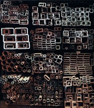 Various metal pipes and tubes arranged neatly