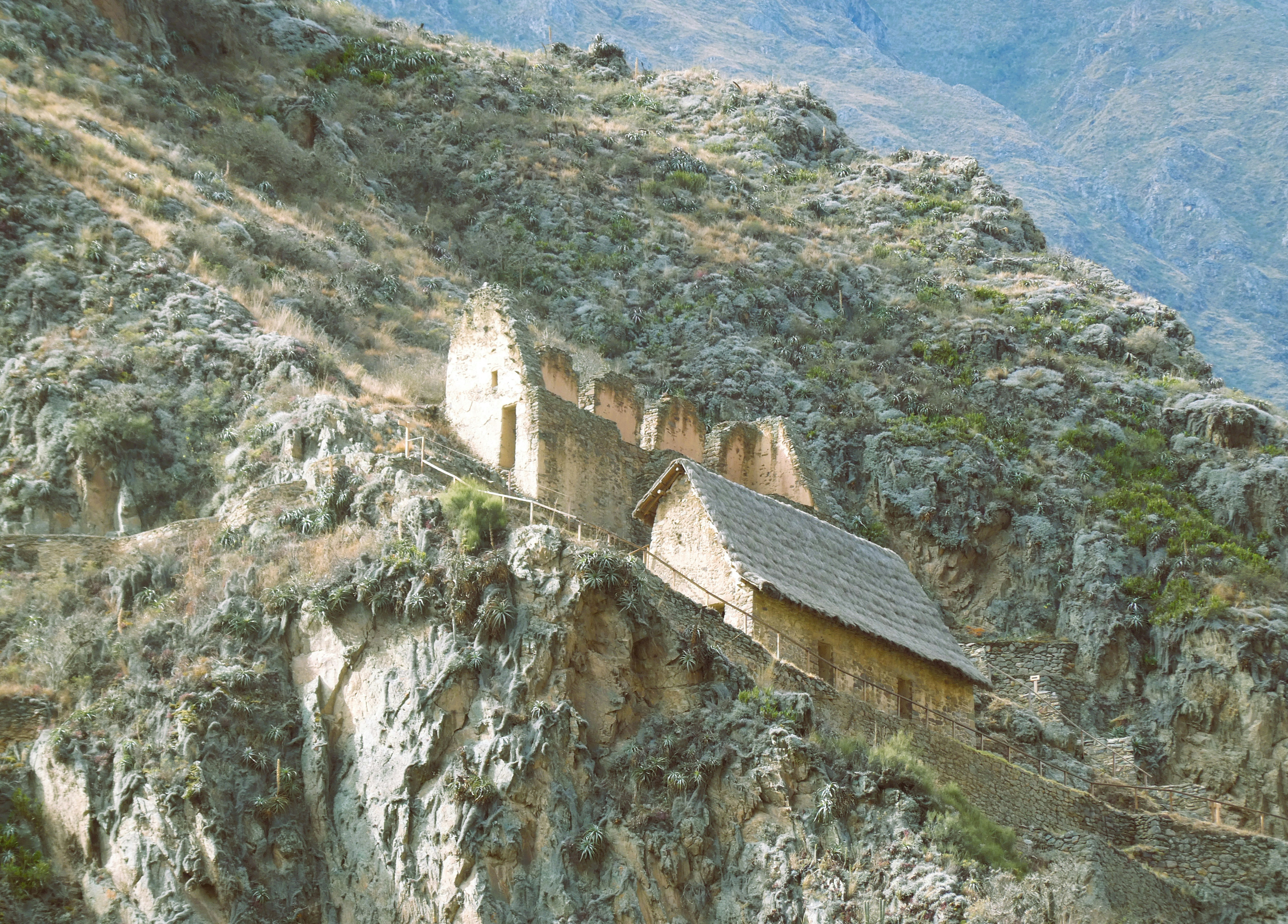Ancient ruins built into a rocky mountainside
