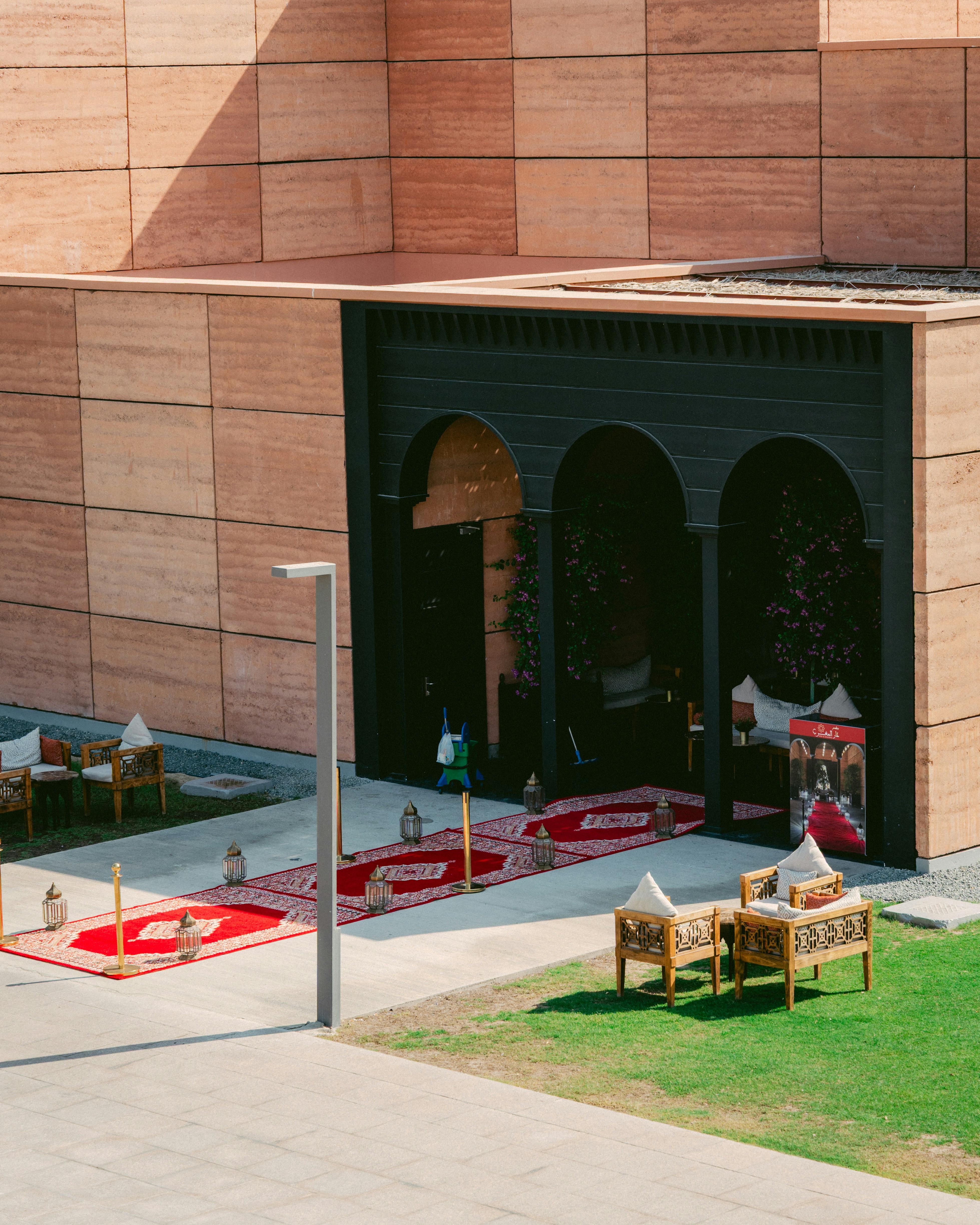 Ornate entrance with rugs and seating areas for seating