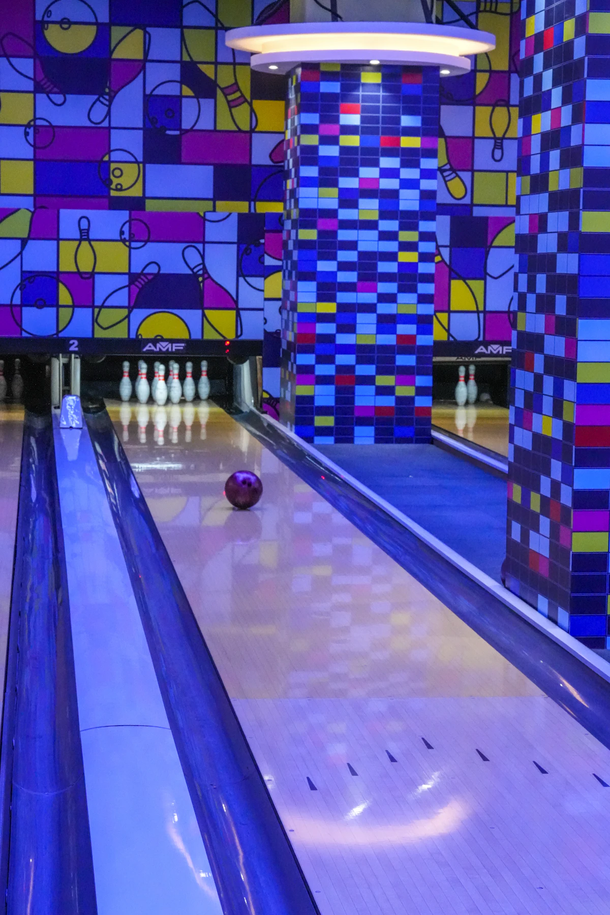 Neon-lit bowling alley
