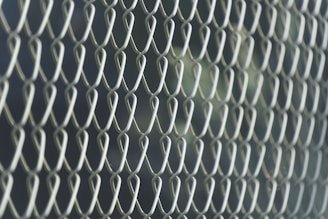 Close-up of a chain-link fence pattern