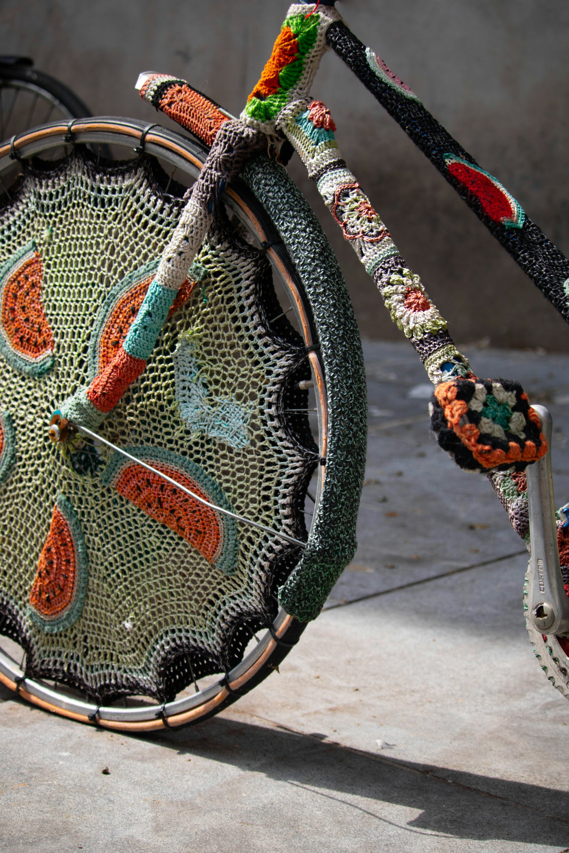 Bicycle decorated with colorful crochet art
