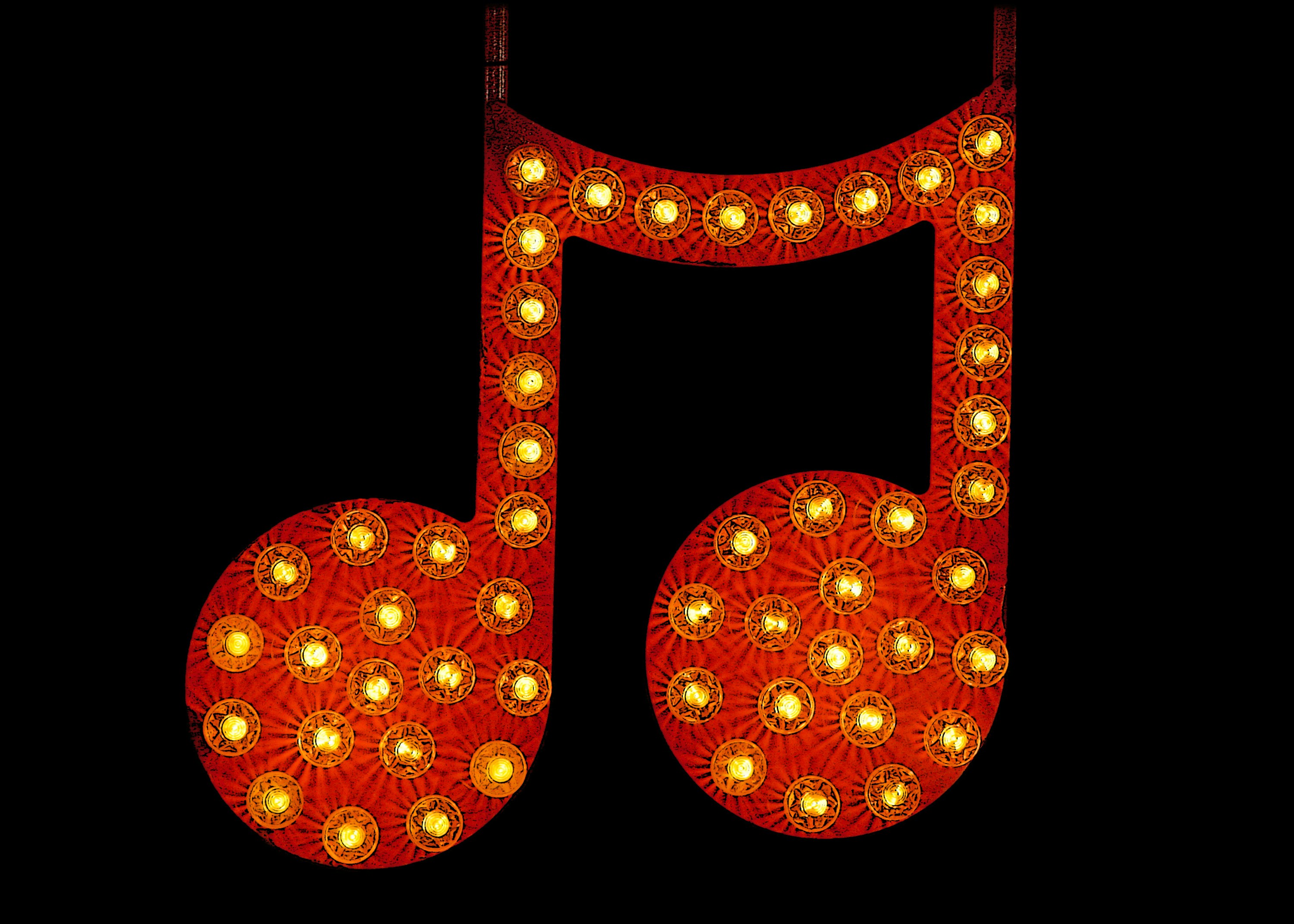 Eine musikalische Note aus roten Lichtern