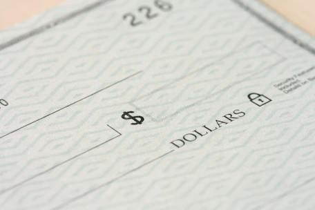 Close-up of a check with dollars field visible