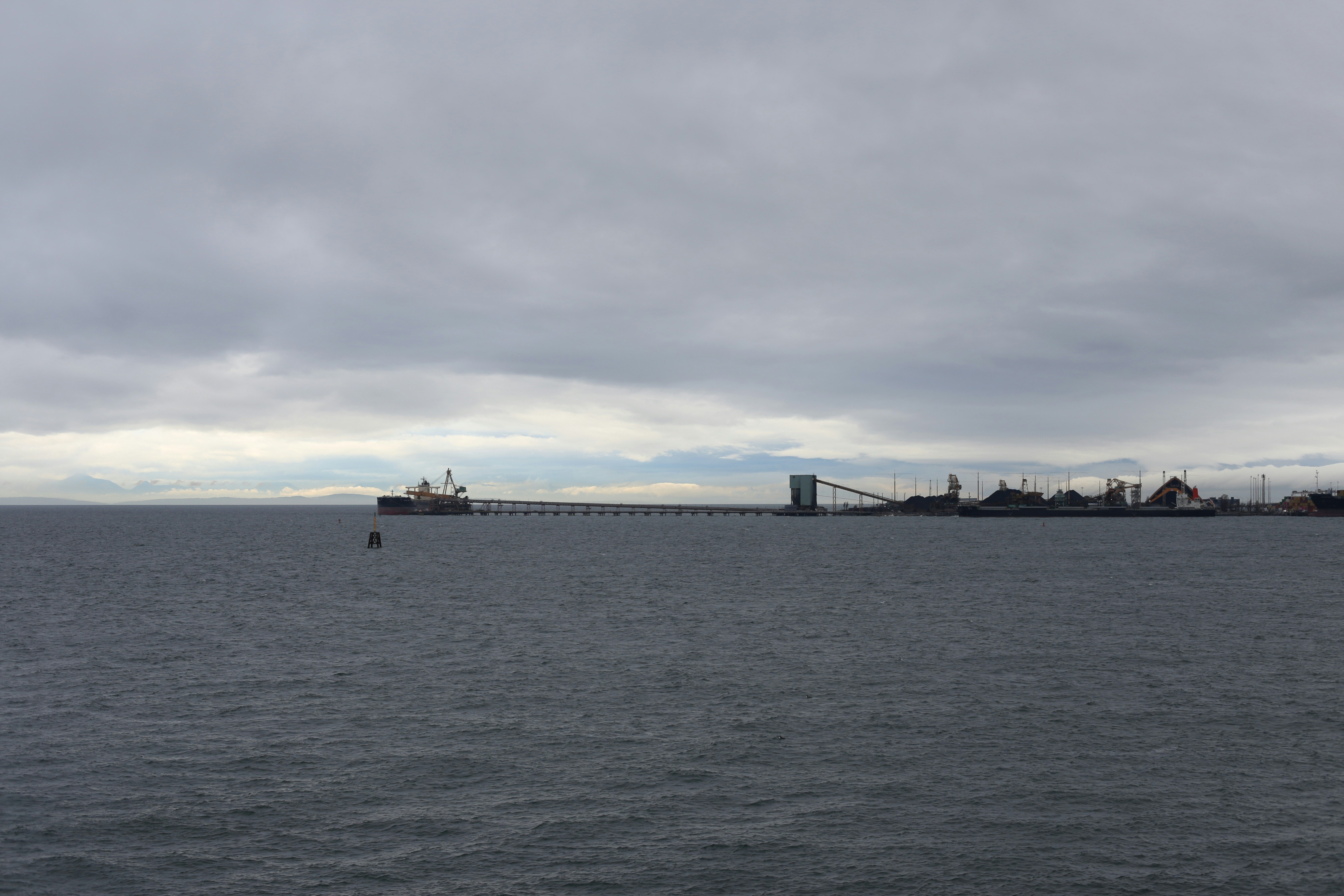 Cargo ship at industrial port